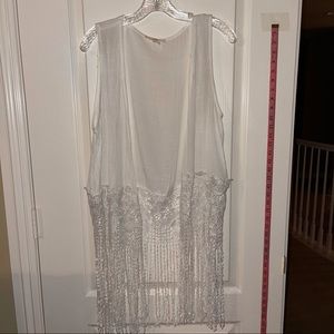 Small white cover up by Entre. Gently worn once.